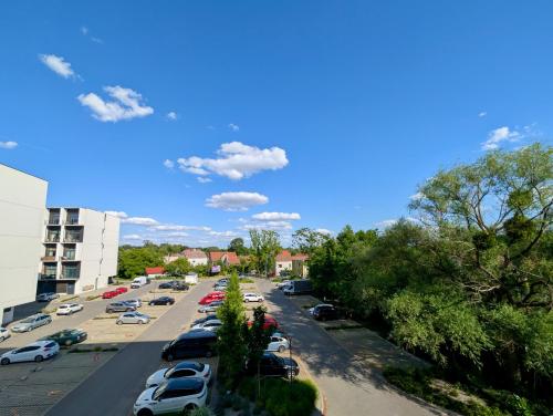 arial view of a parking lot with cars parked at Sky Loft Wrocław Apartment by BookingHost in Wrocław
