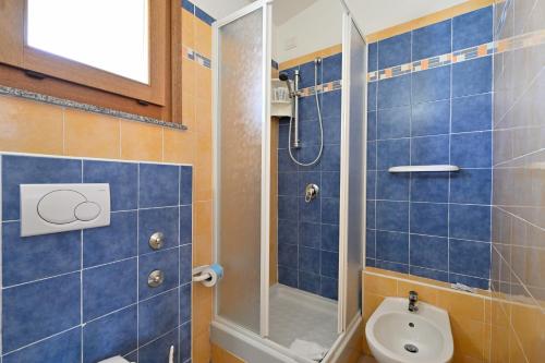 Koupelna v ubytování Baia delle Mimose Hotel