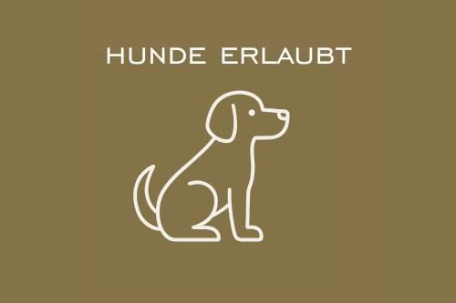 a silhouette of a hunting dog isolated on a white background at Appartement Zimba Blick by A-Appartments in Bürserberg