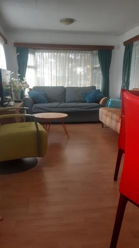 Χώρος καθιστικού στο kitty"s Chalet Modern en toch knus