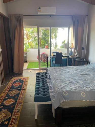 Postel nebo postele na pokoji v ubytování Villa Compartida con Vistas al Mar y la Montaña