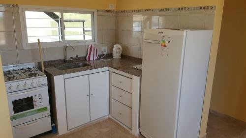 Η κουζίνα ή μικρή κουζίνα στο Apartamentos Los Teros