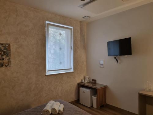 TV a/nebo společenská místnost v ubytování Shamarè Resort ****