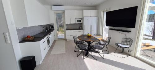 Kuchyň nebo kuchyňský kout v ubytování Villa Lakeside Luxe