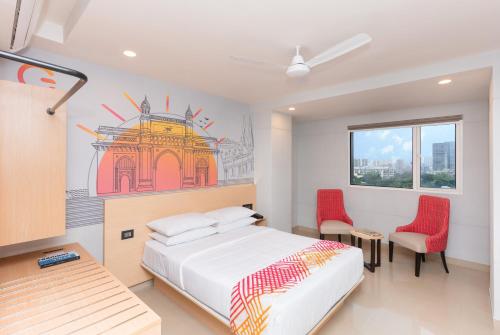 Postel nebo postele na pokoji v ubytování Ginger Mumbai Andheri (MIDC)