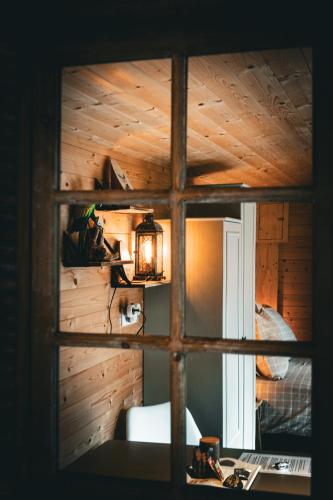 a view of a room through a window at De Zilte Zeehoeve in Ellemeet