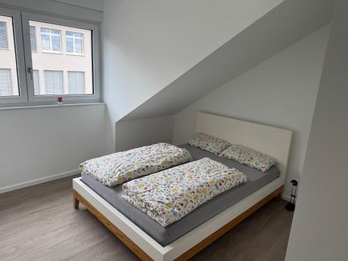 Ένα ή περισσότερα κρεβάτια σε δωμάτιο στο Cosy Apartment mit Fernblick