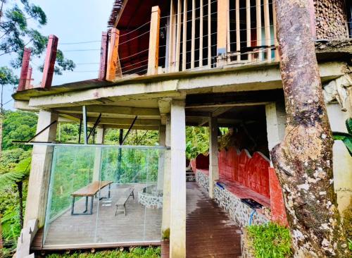 an outside view of a house with a balcony at Forest 101 in Real