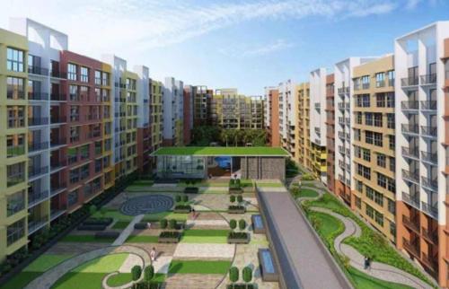 arial view of a courtyard in a city with buildings at Good Stay 2 BHK With Pool View Apartment 6km from Airport, -805 in Dabolim