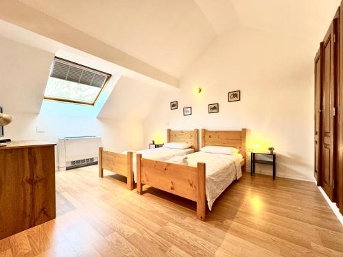 Ένα ή περισσότερα κρεβάτια σε δωμάτιο στο Le Dome-Nobile