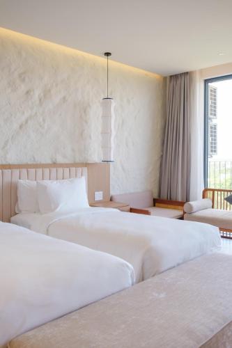 Fotografie z fotogalerie ubytování Wyndham Condotel Hoi An By 2N v destinaci Hà My Tây (2)