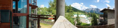 a balcony of a building with a view of a mountain at Shackleton Chalet in Sestriere