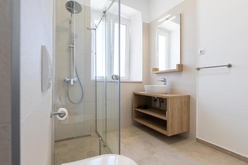 Ένα μπάνιο στο Apartments Cassia