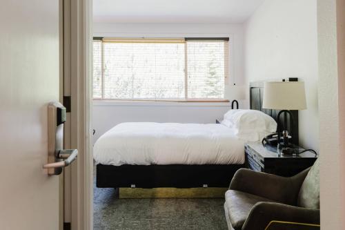 Ένα ή περισσότερα κρεβάτια σε δωμάτιο στο Crystal Mountain Hotels