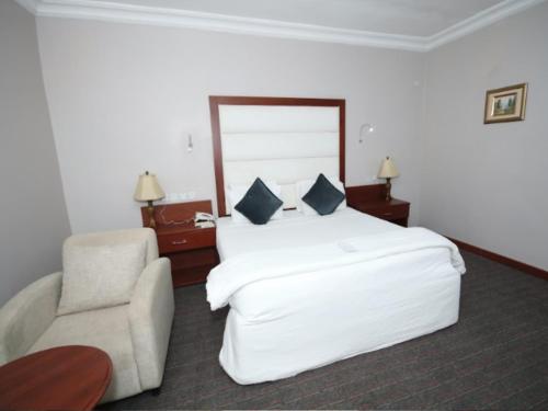 Cama o camas de una habitación en Denis Hotel - Abuja