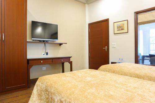 TV a/nebo společenská místnost v ubytování Vikram Vintage Inn