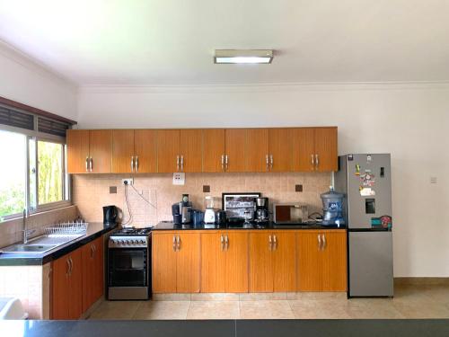 Kuhinja ili čajna kuhinja u objektu WanderHome 3BDR House