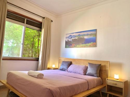 Krevet ili kreveti u jedinici u okviru objekta WanderHome 3BDR House