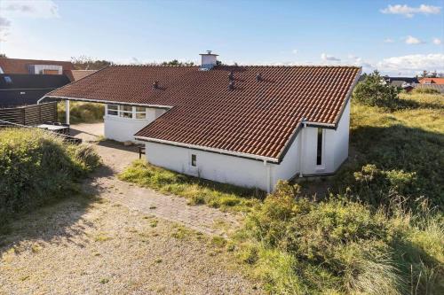 a small white house with a red roof at 984-Thisted-Astien-4 in Torsted