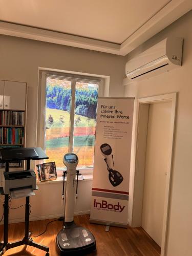 a room with a sign in the corner of a room at Longevity Box in Potsdam