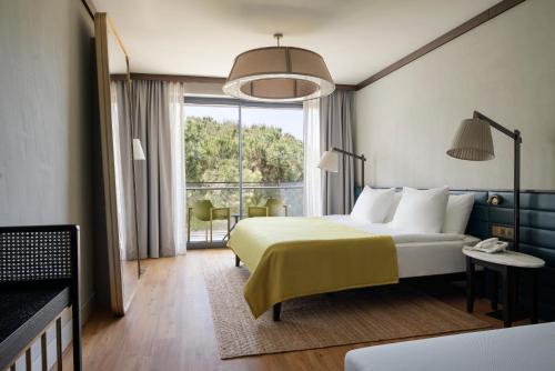 En eller flere senge i et værelse på Voyage Belek Golf & Spa Hotel