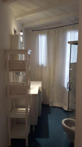 Двухъярусная кровать или двухъярусные кровати в номере Antico Ormeggio