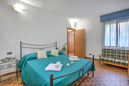 Ένα ή περισσότερα κρεβάτια σε δωμάτιο στο Mark Apartment - Happy Rentals