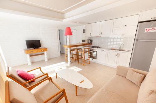 Η κουζίνα ή μικρή κουζίνα στο Kalkan Suite 101