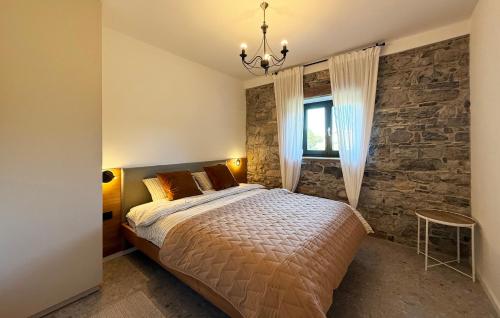 Postel nebo postele na pokoji v ubytování Hiša Bzga - Škocjan Caves