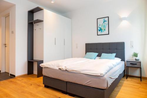 Postel nebo postele na pokoji v ubytování SERVENTO Boardinghouse