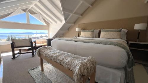 Postel nebo postele na pokoji v ubytování Los Ponchos Hotel