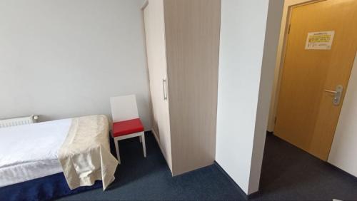 Postel nebo postele na pokoji v ubytování Optima Pochayiv
