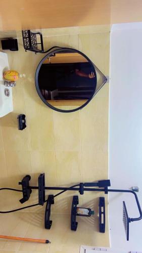 a mirror on the wall of a room at Hõte ibra in Tangier