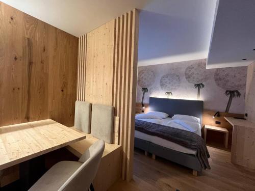 Ένα ή περισσότερα κρεβάτια σε δωμάτιο στο Rauzi apartments