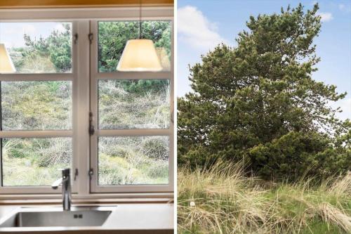 a kitchen sink and a window with a tree at 930-Thisted-Liusborg-Sti-28 in Torsted