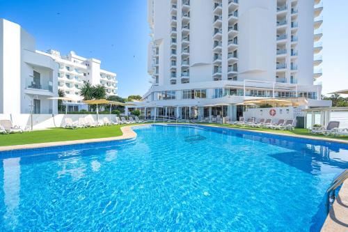 a large swimming pool in front of a building at THB Maria Isabel - Adults Only in Playa de Palma