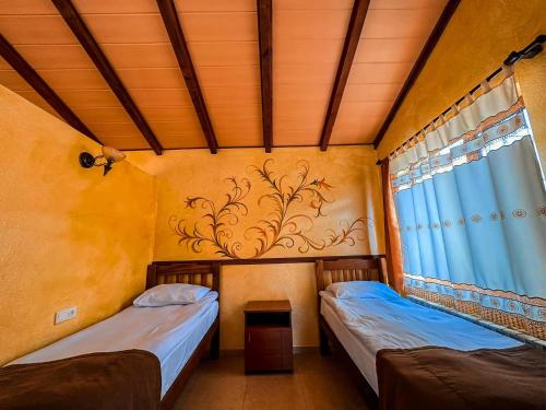Postel nebo postele na pokoji v ubytování Haghartsin Hotel & Restaurant