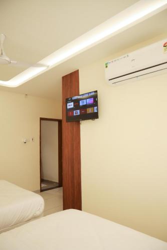Katil atau katil-katil dalam bilik di Hotel Royal Anandraj
