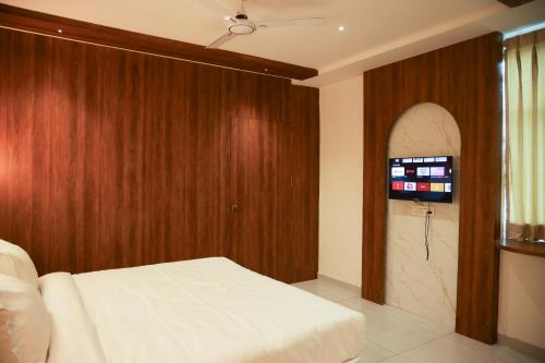 Katil atau katil-katil dalam bilik di Hotel Royal Anandraj