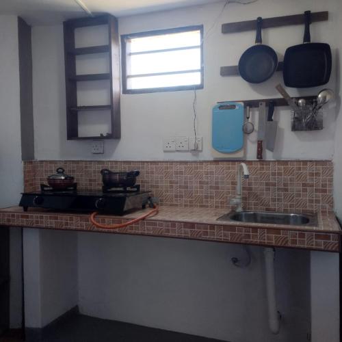 Кухня или мини-кухня в 3 bed rooms Apartment Ahangama
