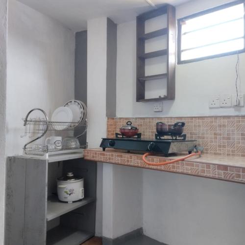 Кухня или мини-кухня в 3 bed rooms Apartment Ahangama
