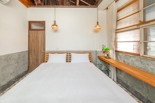 Neat Hostelにあるベッド
