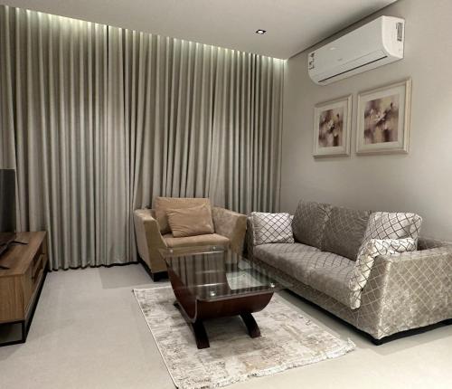 Χώρος καθιστικού στο نزل لينزا هاوس linza suites