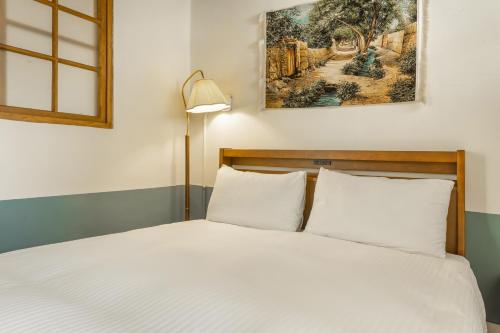 Neat Hostelにあるベッド