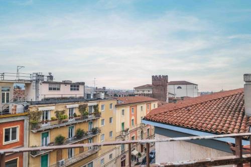 a view of roofs of buildings in a city at Appartamento Al Filarmonico in Verona