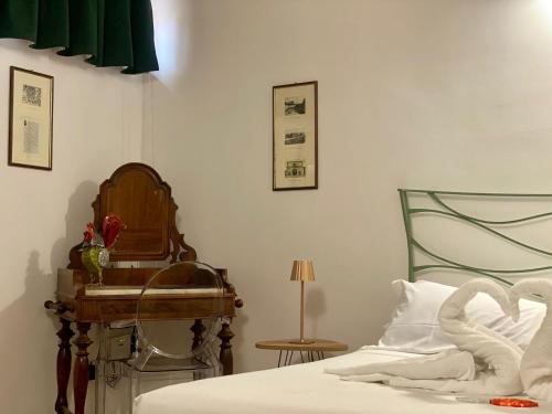 Katil atau katil-katil dalam bilik di Le Cancelle - Residenza d'epoca