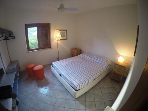 Huone majoituspaikassa Villa Punta Lunga