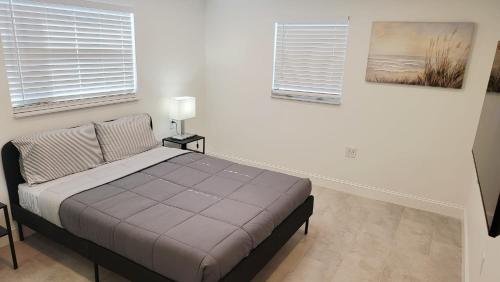 Cama o camas de una habitación en Coastal canal front oasis
