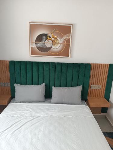 Postel nebo postele na pokoji v ubytování BleuSea Studio's &Appart