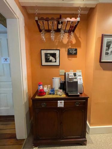 a kitchen with a counter with a coffee maker on it at Jamaicahaus in Jamaica